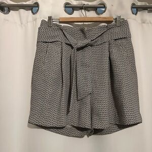 H&M polyester dress shorts, size 8. Never worn!